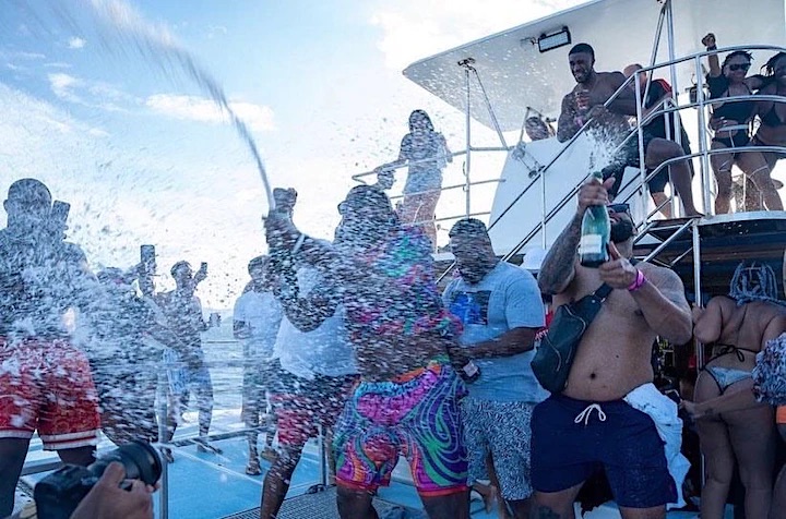 Champagne shower popping on deck